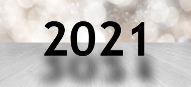 Bokeh ile ahşap arka planda 2021 Yeni Yıl 