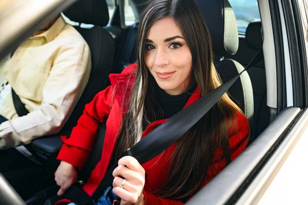 Young Woman Fastening Seat Belt — Stock Photo, Image