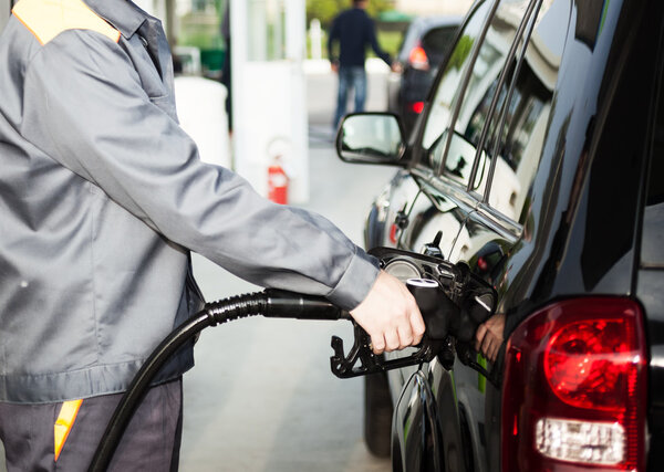 Gas station attendant at work
