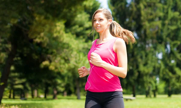 Woman running outdoors — Stock Photo, Image