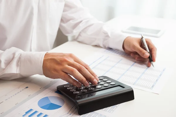 Accountant checking numbers Stock Image
