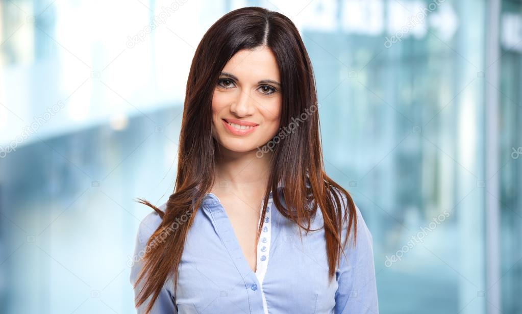 Smiling businesswoman in an urban setting