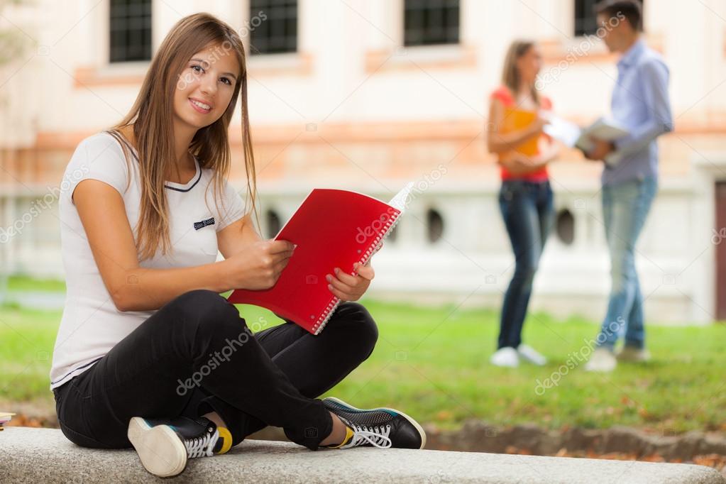 Woman reading notebook