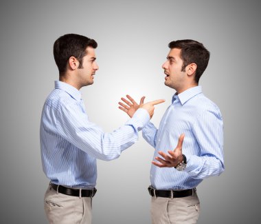 Man talking to clone of himself clipart