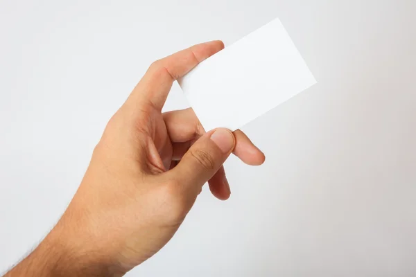 Hand holding blank business card — Stock Photo, Image