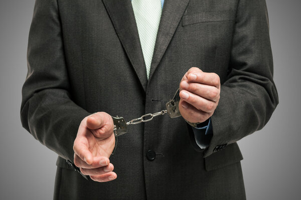 Handcuffed businessman