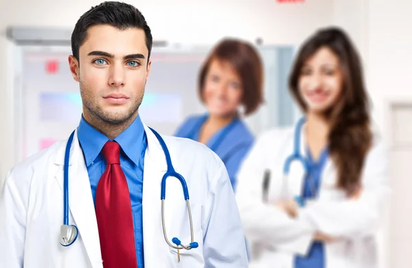 Doctor and his team — Stock Photo, Image