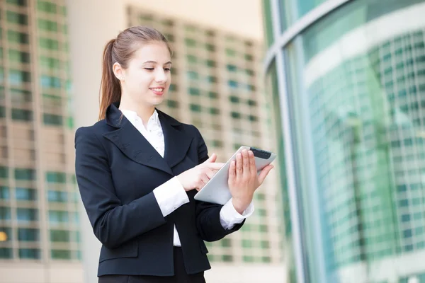 Woman using digital tablet — Stock Photo, Image