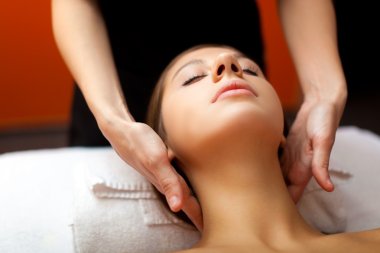 Beautiful woman having facial massage