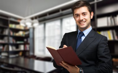 bir gündem tutan işadamı