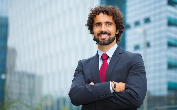 Knappe lachende business man portret — Stockfoto