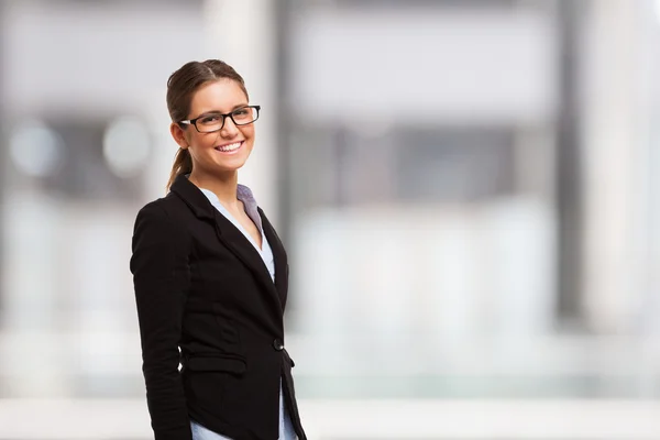 Mujer sonriente con anteojos —  Fotos de Stock