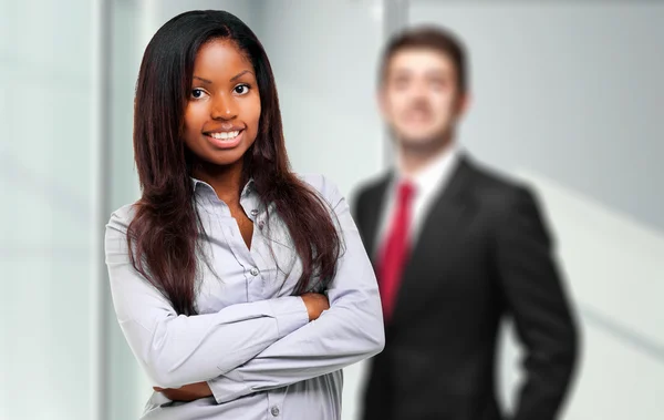 Businesswoman and her partner smiling — Stock Photo, Image