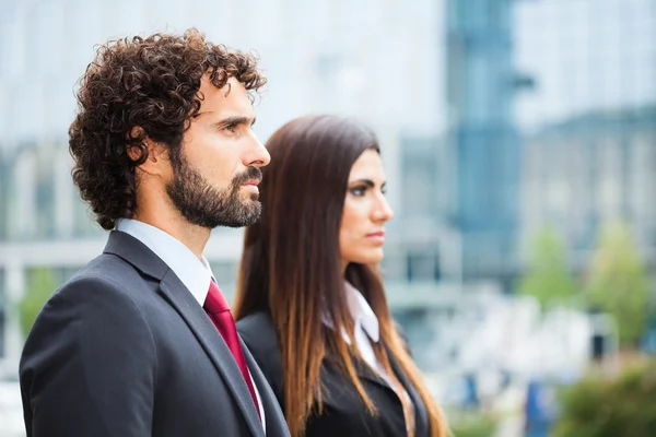 Business people smiling — Stock Photo, Image