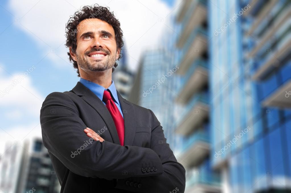 Businessman smiling outdoors