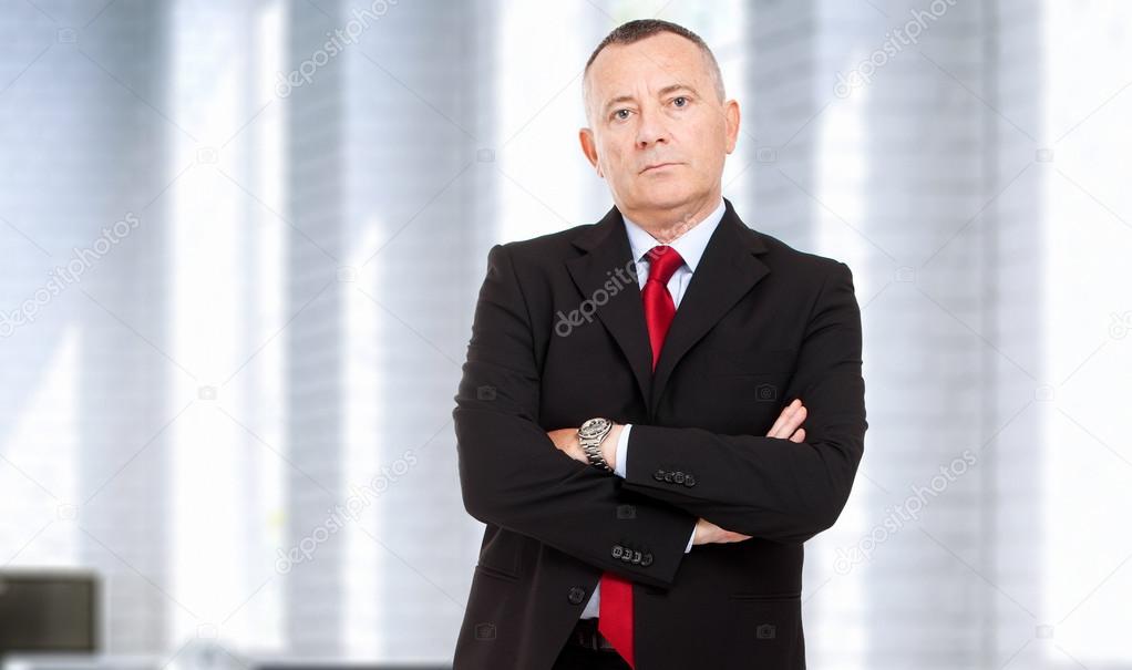 Mature businessman in his office