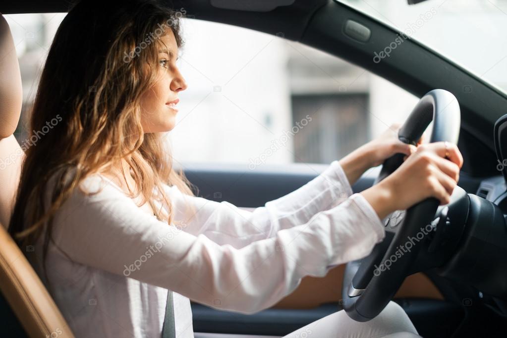 Woman driving her car