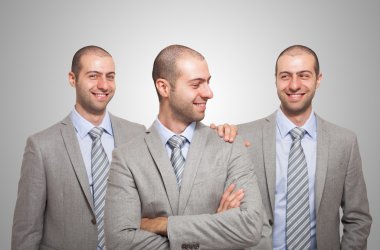 Businessman congratulating with himself clipart