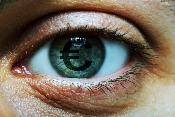 Homme avec un symbole euro dans les yeux — Photo