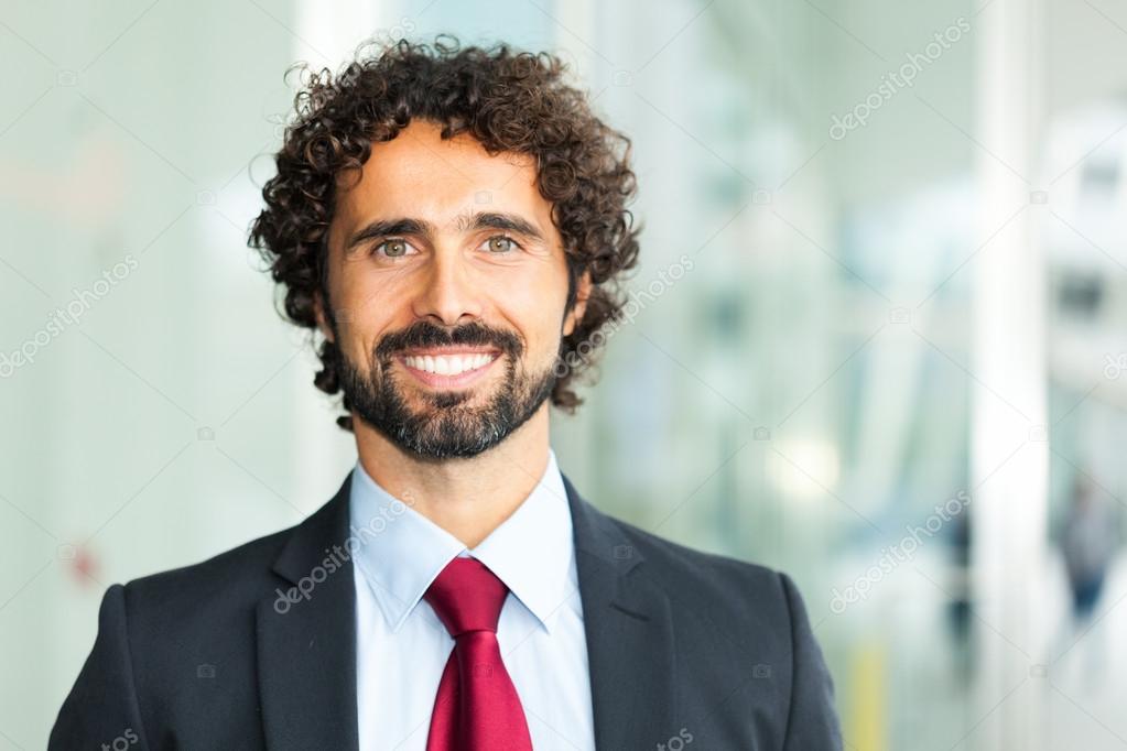 Handsome smiling business man portrait