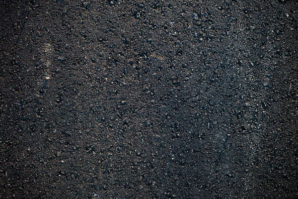 Dark rough asphalt Royalty Free Stock Images