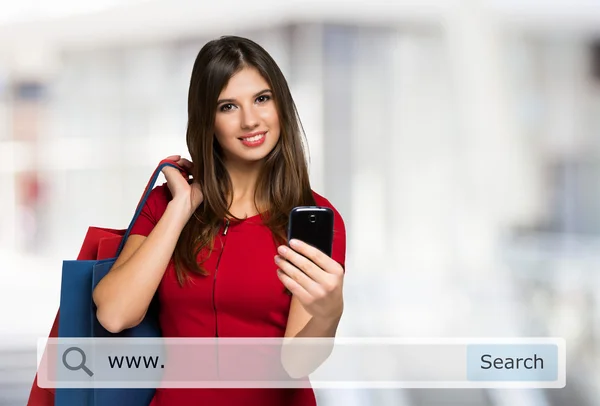 Mujer sosteniendo bolsas de compras — Foto de Stock