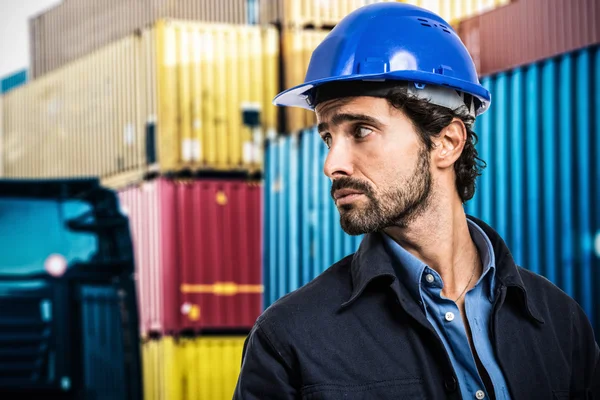 Worker in front of containers — Stock Photo, Image