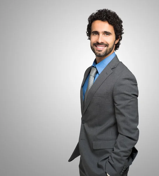 Smiling handsome businessman — Stock Photo, Image