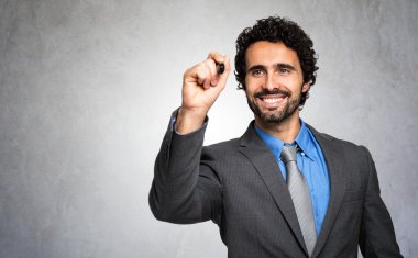 İşadamı holding kalem gülümseyen