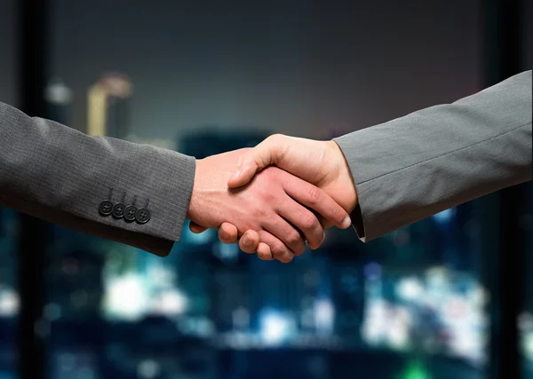 Businessmen shaking their hands — Stock Photo, Image