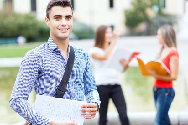Students in front of school — Stock Photo, Image