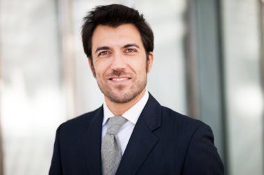 Handsome confident businessman