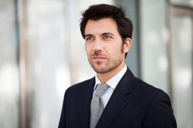 Handsome confident businessman