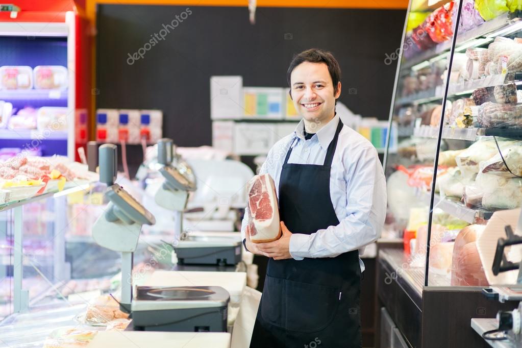 Storekeeper in his grocery store