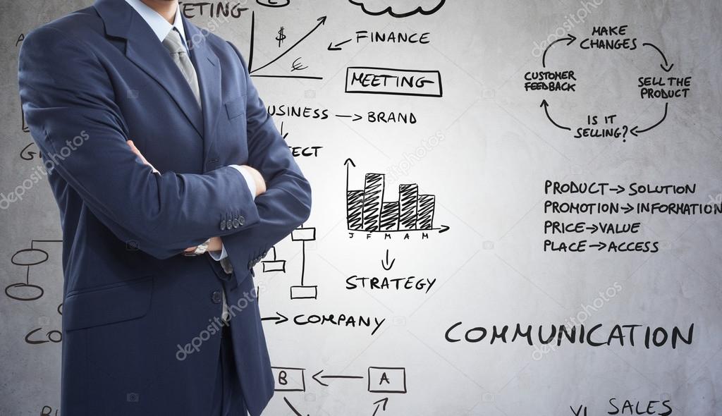 Businessman with diagrams and charts
