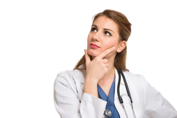 Female doctor looking up — Stock Photo, Image
