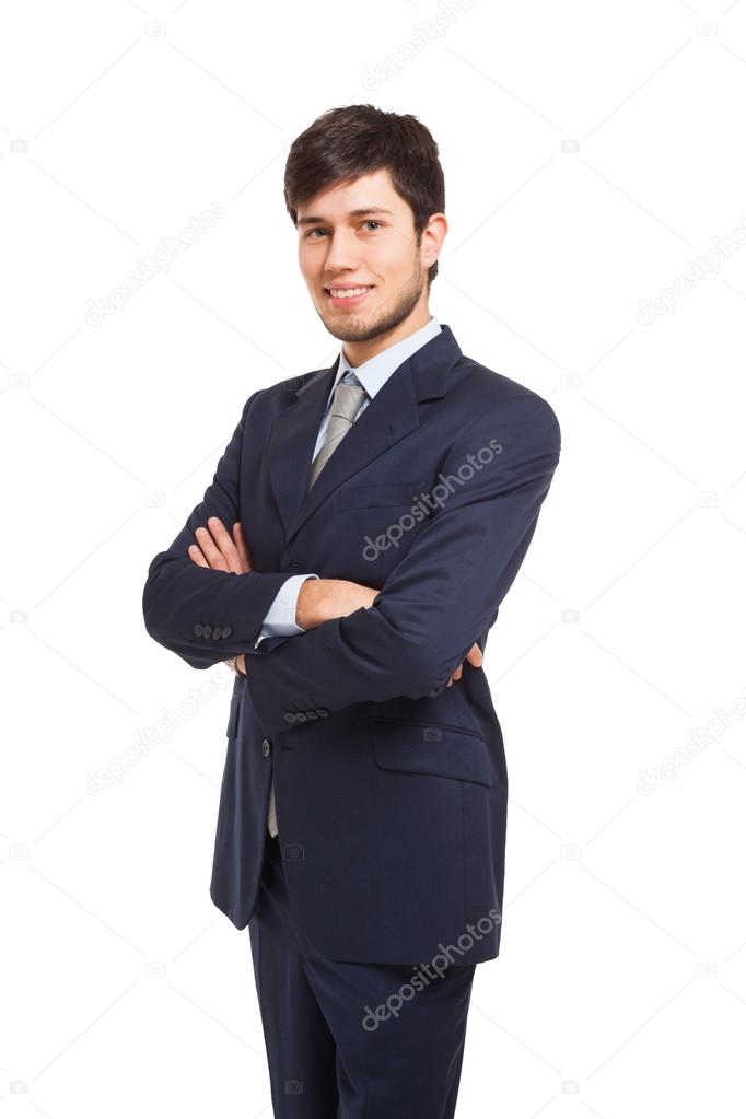 Young businessman with folded arms