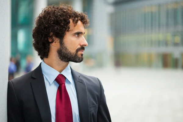 Handsome businessman looking at side — Stock Photo, Image