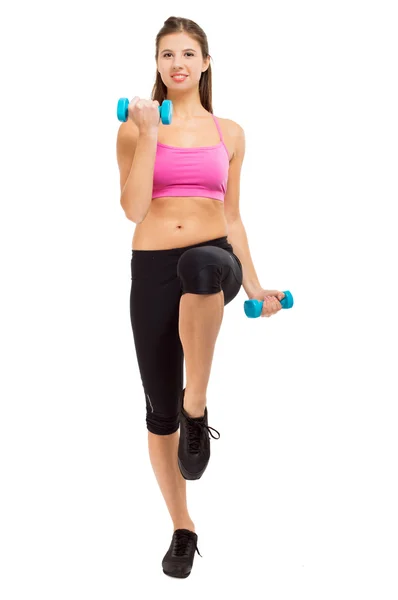 Mujer entrenando con pesas — Foto de Stock