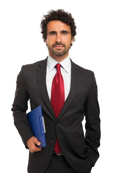 Businessman holding clipboard — Stock Photo, Image