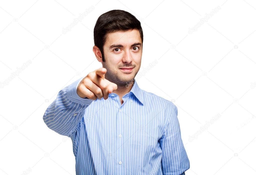 Businessman pointing his finger at you