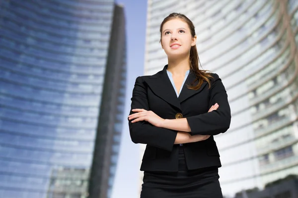 Businesswoman in urban setting — Stock Photo, Image