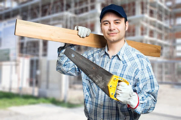 Carpenter with his tools — Stock Photo, Image