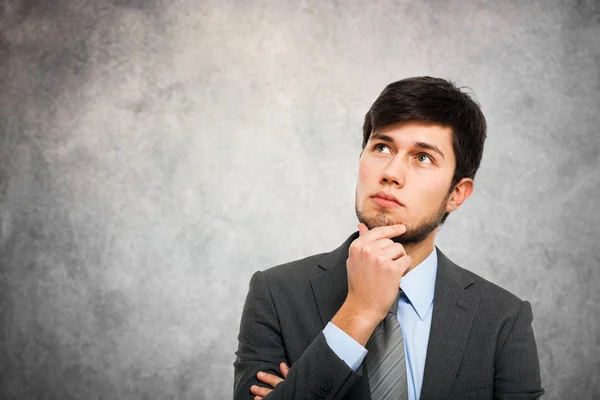 Thoughtful handsome businessman — Stock Photo, Image