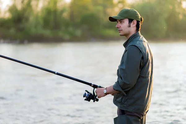 Young fisherman at river — Stock Photo, Image