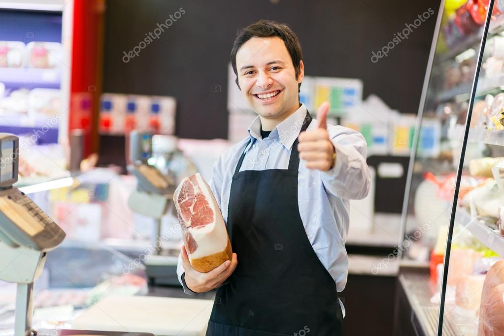 Storekeeper showing thumb up