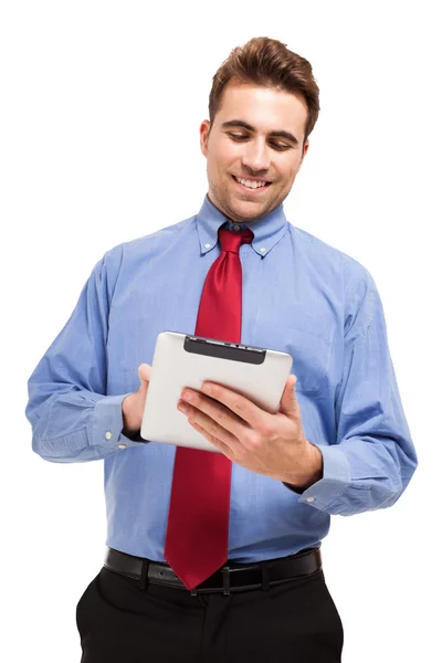 Empresário sorrindo usando seu tablet — Fotografia de Stock