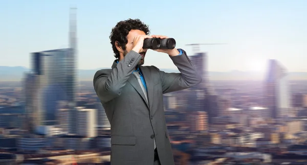 Businessman in search for opportunities — Stock Photo, Image