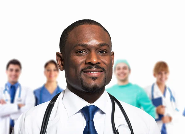 African doctor in front of medical team Royalty Free Stock Photos