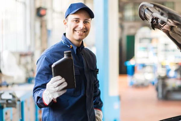 Mechanische bedrijf kruik van motor olie — Stockfoto